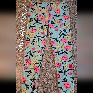 LuLaRoe Leggings TC Disney Inspired Roses Teal Green Background